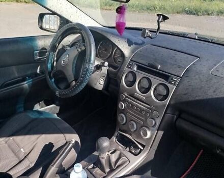 Черный Мазда 6, объемом двигателя 2 л и пробегом 300 тыс. км за 4300 $, фото 4 на Automoto.ua