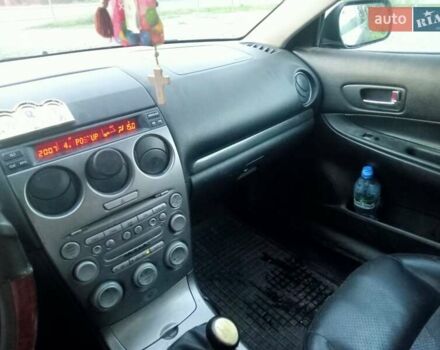 Черный Мазда 6, объемом двигателя 2 л и пробегом 445 тыс. км за 1750 $, фото 4 на Automoto.ua
