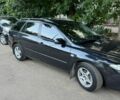 Черный Мазда 6, объемом двигателя 2.3 л и пробегом 400 тыс. км за 2600 $, фото 1 на Automoto.ua