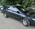 Черный Мазда 6, объемом двигателя 2.3 л и пробегом 370 тыс. км за 2399 $, фото 1 на Automoto.ua