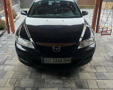 Черный Мазда 6, объемом двигателя 1.8 л и пробегом 173 тыс. км за 4200 $, фото 1 на Automoto.ua