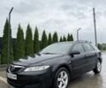 Черный Мазда 6, объемом двигателя 2 л и пробегом 270 тыс. км за 3700 $, фото 1 на Automoto.ua