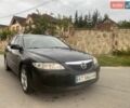 Черный Мазда 6, объемом двигателя 2 л и пробегом 250 тыс. км за 2250 $, фото 1 на Automoto.ua