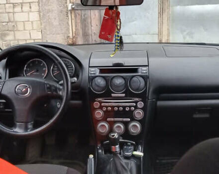 Черный Мазда 6, объемом двигателя 2 л и пробегом 352 тыс. км за 2700 $, фото 7 на Automoto.ua