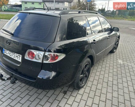 Чорний Мазда 6, об'ємом двигуна 2 л та пробігом 250 тис. км за 2100 $, фото 5 на Automoto.ua