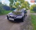 Черный Мазда 6, объемом двигателя 2 л и пробегом 416 тыс. км за 3800 $, фото 1 на Automoto.ua