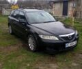 Черный Мазда 6, объемом двигателя 2 л и пробегом 399 тыс. км за 3200 $, фото 1 на Automoto.ua