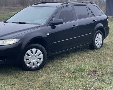 Черный Мазда 6, объемом двигателя 2 л и пробегом 280 тыс. км за 4500 $, фото 11 на Automoto.ua