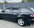 Черный Мазда 6, объемом двигателя 2 л и пробегом 330 тыс. км за 4750 $, фото 1 на Automoto.ua