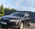 Черный Мазда 6, объемом двигателя 2 л и пробегом 345 тыс. км за 3500 $, фото 1 на Automoto.ua