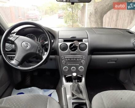 Черный Мазда 6, объемом двигателя 1.8 л и пробегом 206 тыс. км за 2999 $, фото 6 на Automoto.ua