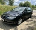 Черный Мазда 6, объемом двигателя 1.8 л и пробегом 252 тыс. км за 2800 $, фото 1 на Automoto.ua