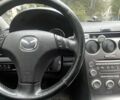 Черный Мазда 6, объемом двигателя 2 л и пробегом 275 тыс. км за 2000 $, фото 1 на Automoto.ua