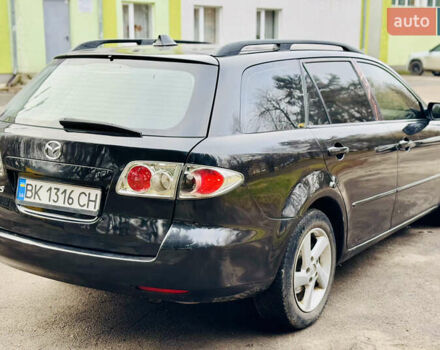 Черный Мазда 6, объемом двигателя 2 л и пробегом 350 тыс. км за 3000 $, фото 1 на Automoto.ua