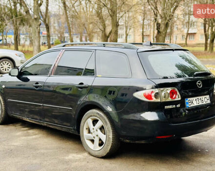 Черный Мазда 6, объемом двигателя 2 л и пробегом 350 тыс. км за 3000 $, фото 4 на Automoto.ua