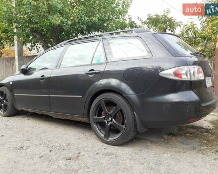 Черный Мазда 6, объемом двигателя 1.8 л и пробегом 206 тыс. км за 2999 $, фото 3 на Automoto.ua