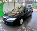 Черный Мазда 6, объемом двигателя 2 л и пробегом 293 тыс. км за 3800 $, фото 1 на Automoto.ua