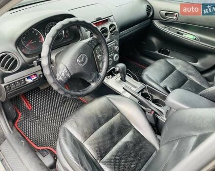 Чорний Мазда 6, об'ємом двигуна 2 л та пробігом 325 тис. км за 5500 $, фото 6 на Automoto.ua
