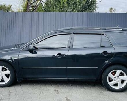 Чорний Мазда 6, об'ємом двигуна 2 л та пробігом 325 тис. км за 5500 $, фото 1 на Automoto.ua