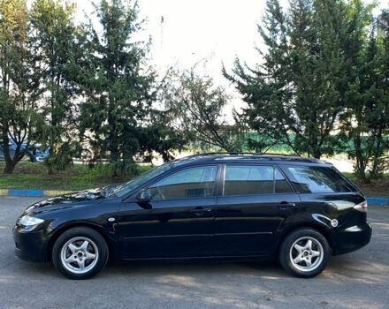 Чорний Мазда 6, об'ємом двигуна 2 л та пробігом 312 тис. км за 2999 $, фото 4 на Automoto.ua