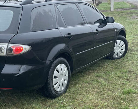 Черный Мазда 6, объемом двигателя 2 л и пробегом 280 тыс. км за 4500 $, фото 12 на Automoto.ua