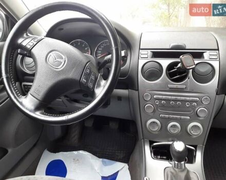 Черный Мазда 6, объемом двигателя 1.8 л и пробегом 206 тыс. км за 2999 $, фото 7 на Automoto.ua