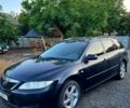 Черный Мазда 6, объемом двигателя 2 л и пробегом 250 тыс. км за 1800 $, фото 1 на Automoto.ua