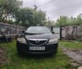 Черный Мазда 6, объемом двигателя 2 л и пробегом 292 тыс. км за 3000 $, фото 1 на Automoto.ua