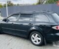 Черный Мазда 6, объемом двигателя 2 л и пробегом 330 тыс. км за 4750 $, фото 1 на Automoto.ua