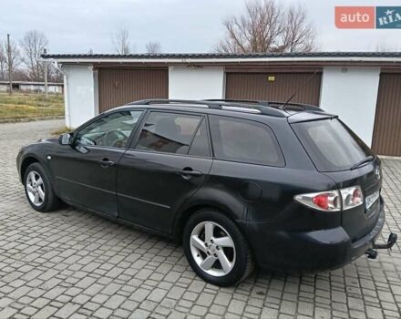 Чорний Мазда 6, об'ємом двигуна 2 л та пробігом 250 тис. км за 1950 $, фото 4 на Automoto.ua