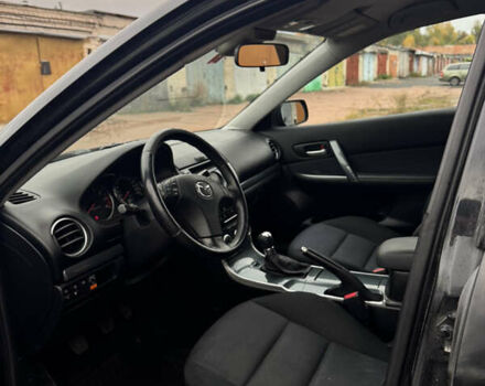 Черный Мазда 6, объемом двигателя 2 л и пробегом 309 тыс. км за 3700 $, фото 6 на Automoto.ua