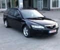 Чорний Мазда 6, об'ємом двигуна 2 л та пробігом 241 тис. км за 1950 $, фото 1 на Automoto.ua