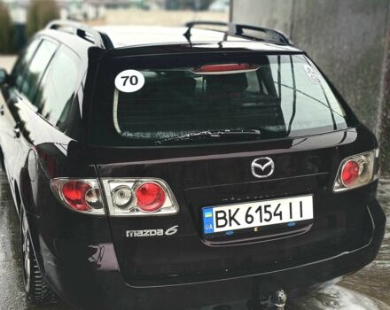 Черный Мазда 6, объемом двигателя 2 л и пробегом 260 тыс. км за 4400 $, фото 4 на Automoto.ua