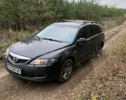Черный Мазда 6, объемом двигателя 2.3 л и пробегом 300 тыс. км за 6000 $, фото 1 на Automoto.ua