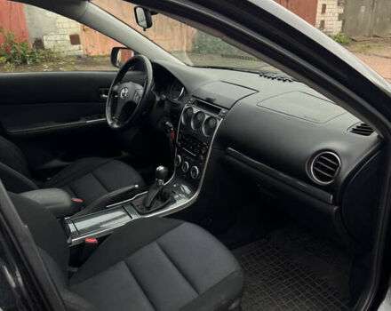 Черный Мазда 6, объемом двигателя 2 л и пробегом 309 тыс. км за 3700 $, фото 8 на Automoto.ua