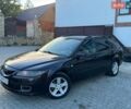 Черный Мазда 6, объемом двигателя 2 л и пробегом 350 тыс. км за 2200 $, фото 1 на Automoto.ua