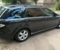 Черный Мазда 6, объемом двигателя 2 л и пробегом 246 тыс. км за 2800 $, фото 1 на Automoto.ua