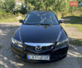 Черный Мазда 6, объемом двигателя 2 л и пробегом 220 тыс. км за 4900 $, фото 1 на Automoto.ua