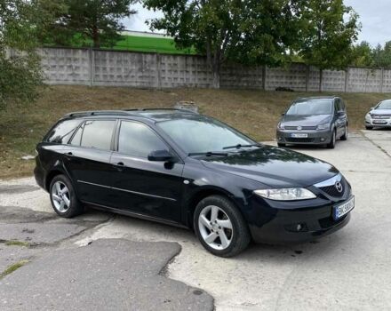 Черный Мазда 6, объемом двигателя 2 л и пробегом 280 тыс. км за 2350 $, фото 1 на Automoto.ua