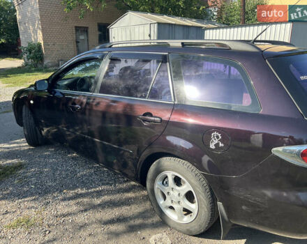 Черный Мазда 6, объемом двигателя 2 л и пробегом 220 тыс. км за 4900 $, фото 5 на Automoto.ua