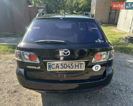 Черный Мазда 6, объемом двигателя 2 л и пробегом 220 тыс. км за 4900 $, фото 4 на Automoto.ua