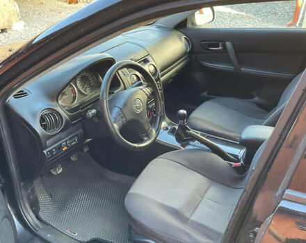 Черный Мазда 6, объемом двигателя 2 л и пробегом 271 тыс. км за 4900 $, фото 7 на Automoto.ua