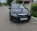 Черный Мазда 6, объемом двигателя 1.8 л и пробегом 240 тыс. км за 3900 $, фото 1 на Automoto.ua