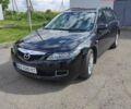 Черный Мазда 6, объемом двигателя 2 л и пробегом 210 тыс. км за 4400 $, фото 1 на Automoto.ua
