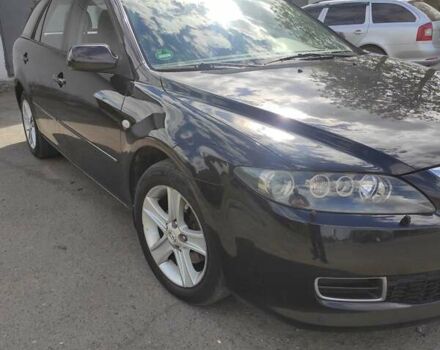 Черный Мазда 6, объемом двигателя 2 л и пробегом 210 тыс. км за 4400 $, фото 6 на Automoto.ua