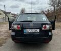 Черный Мазда 6, объемом двигателя 2 л и пробегом 387 тыс. км за 4200 $, фото 1 на Automoto.ua