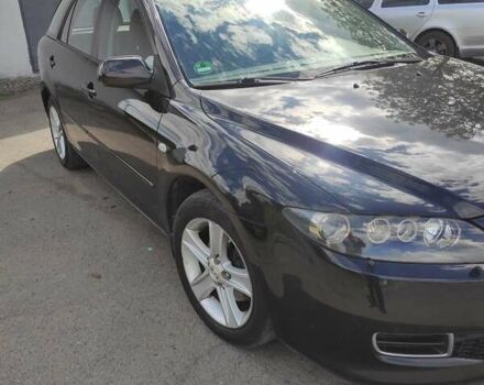 Черный Мазда 6, объемом двигателя 2 л и пробегом 210 тыс. км за 4400 $, фото 3 на Automoto.ua