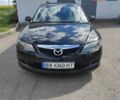 Черный Мазда 6, объемом двигателя 2 л и пробегом 210 тыс. км за 4400 $, фото 1 на Automoto.ua