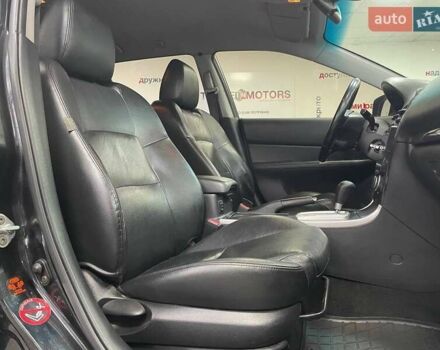 Черный Мазда 6, объемом двигателя 2.26 л и пробегом 307 тыс. км за 5990 $, фото 31 на Automoto.ua