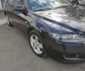 Черный Мазда 6, объемом двигателя 2 л и пробегом 210 тыс. км за 4400 $, фото 2 на Automoto.ua